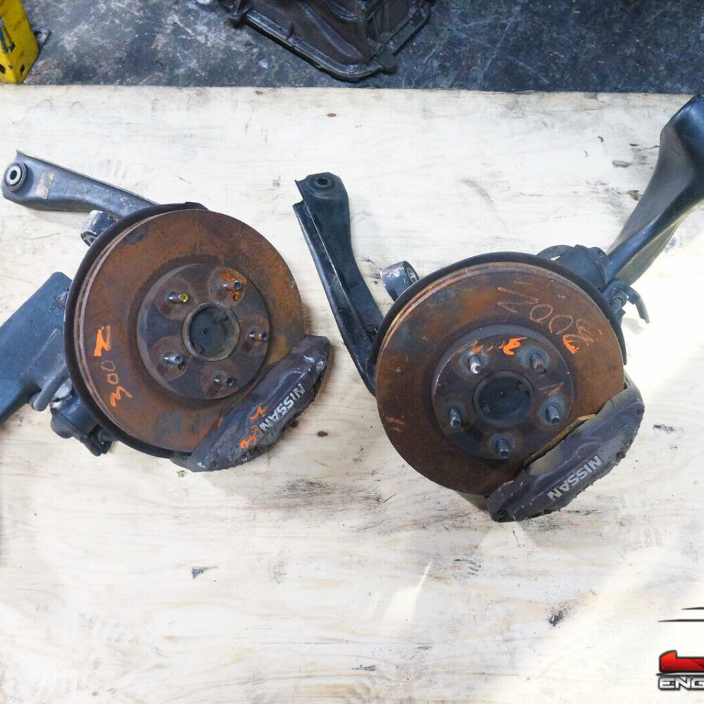 JDM 1989-1994 Nissan 300ZX Z32 Front Spindle 4 Piston Brake Caliper 5 Lug Hub